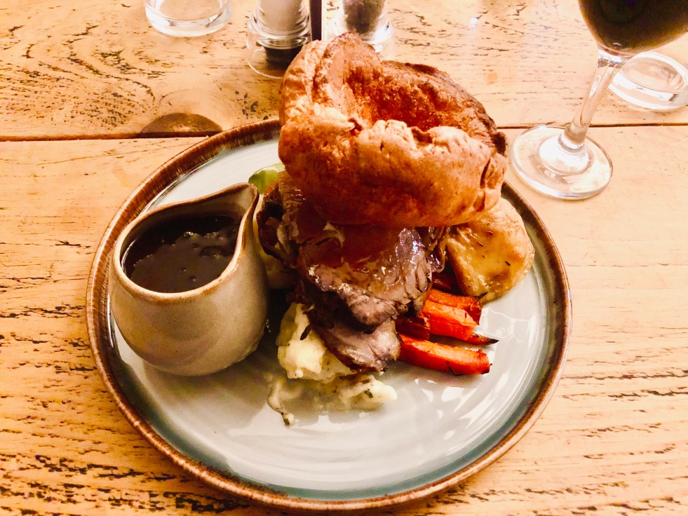 British Sunday roast beef dinner with Yorkshire pudding